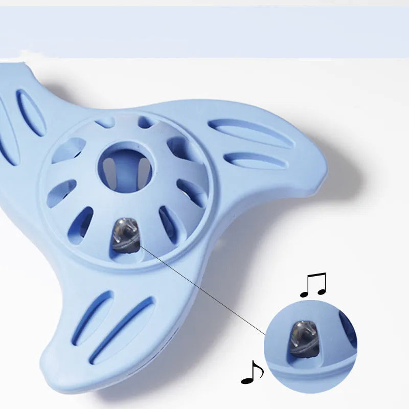 Blue bite-resistant boomerang dog toy for medium and large breeds on a plain background