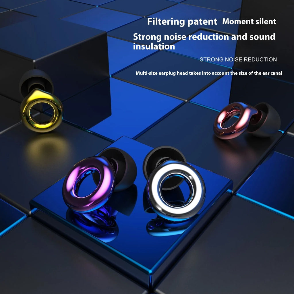Set of coloured silicone sleep earplugs in gold, silver, purple, rose gold, and transparent with a black storage box.