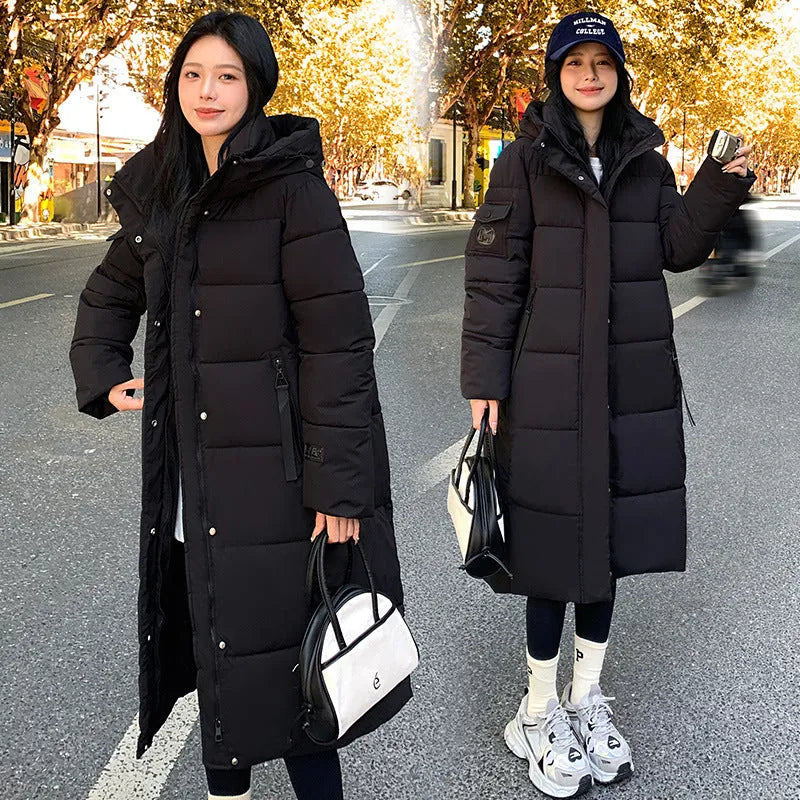 Korean-style quilted cold-proof jacket in black, shown with regular long sleeves.