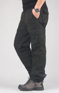 Men's thick cotton velvet overalls in Army Green, loose fit with straight legs, stone wash finish.