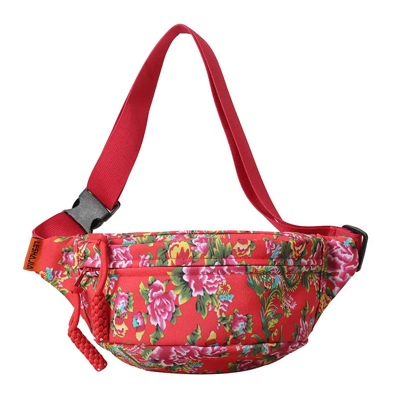 Western style women's waist bag with floral design in black, measuring 32cm wide with 3D pockets