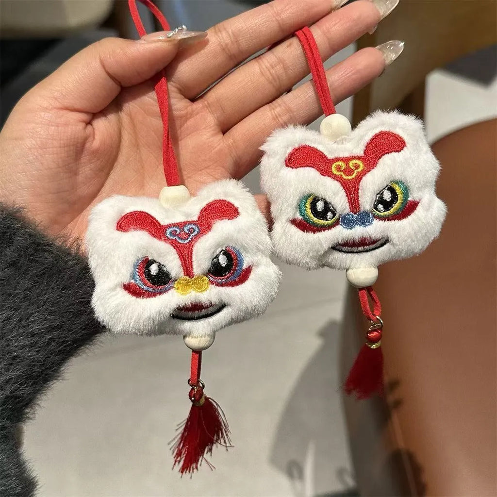 Handmade blue and yellow plush lion keychain ornament with star stone and tassels