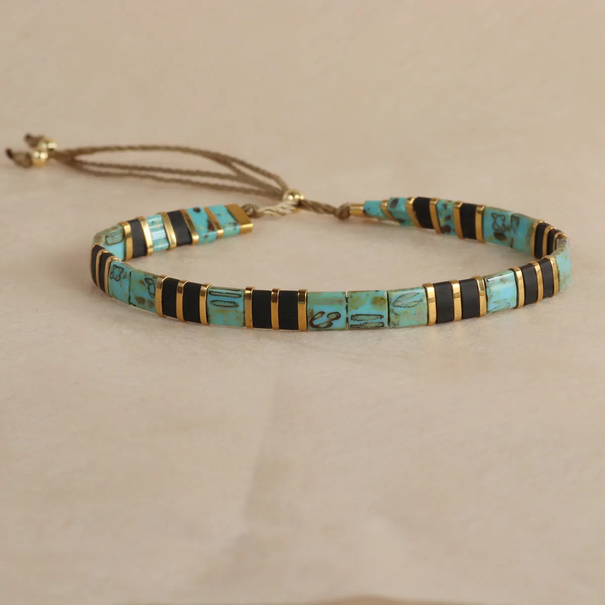 European American style pull bead bracelet with geometric designs in five colour options