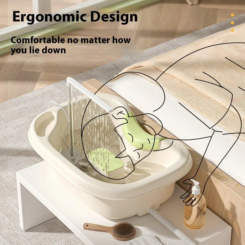 Beige and light pink plastic shampoo basin set for bed use with pump, pillow, and brush.