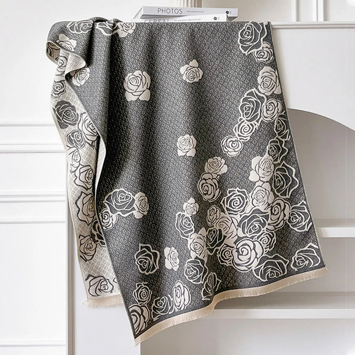 Long gray imitation cashmere scarf with tassel fringe, shown draped, for winter wear.