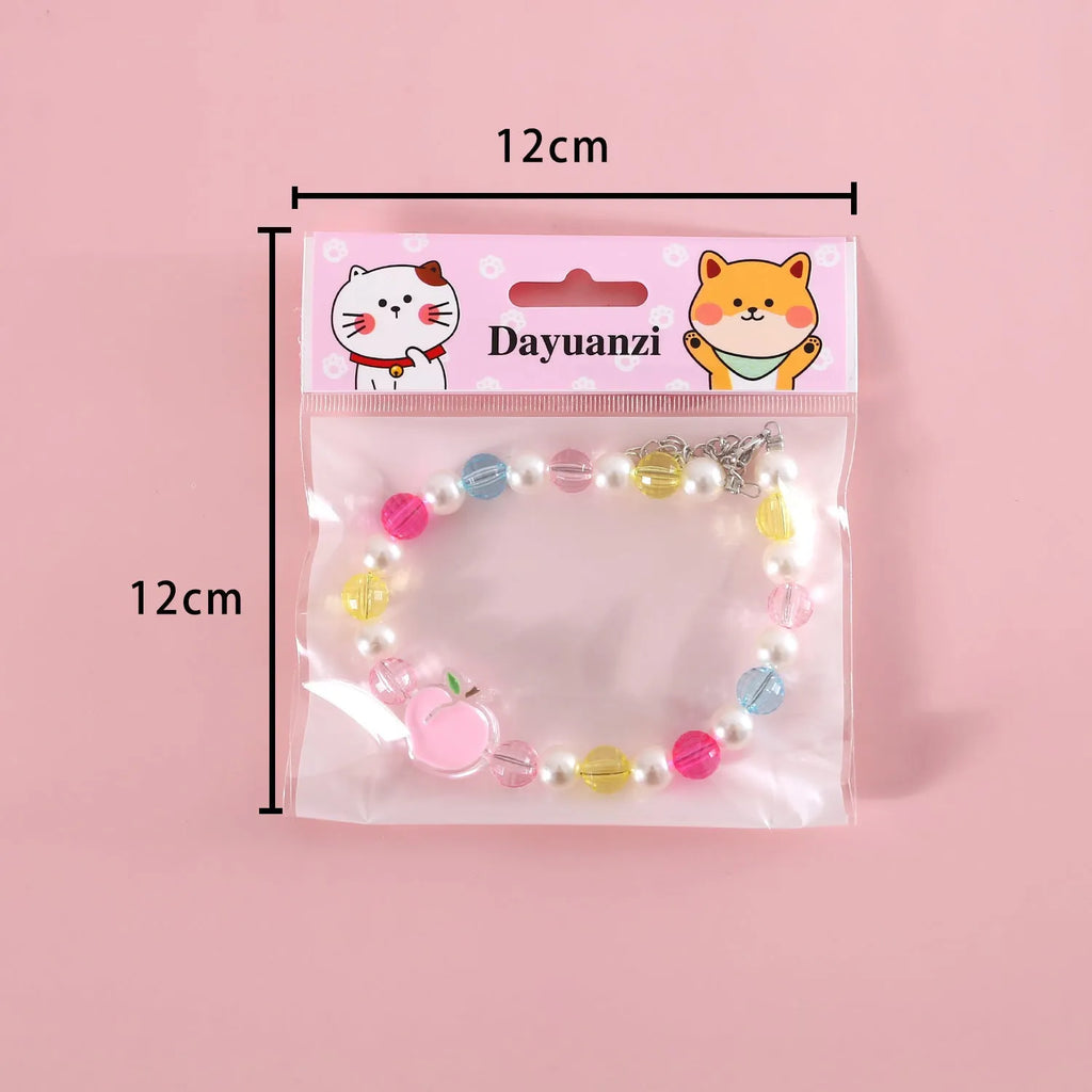 Adjustable colourful beads plastic cat necklace in peach, rainbow and small flower designs