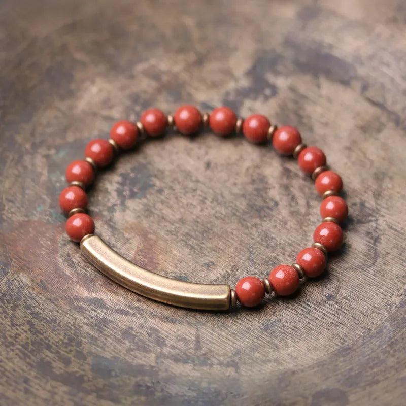 Layered ethnic bracelet for men and women in natural stone and brass, showing colour options.