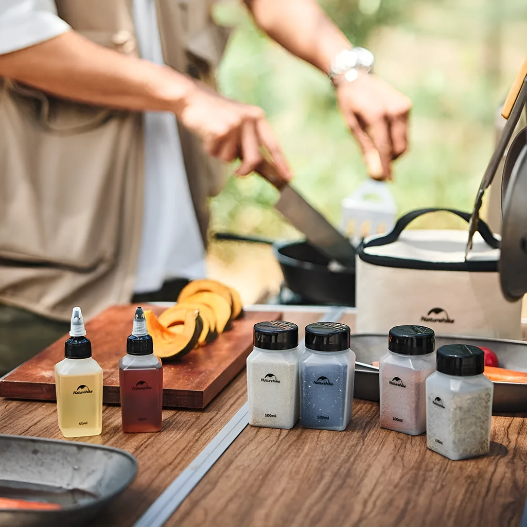Naturehike six-piece portable plastic seasoning bottle set for outdoor cooking.