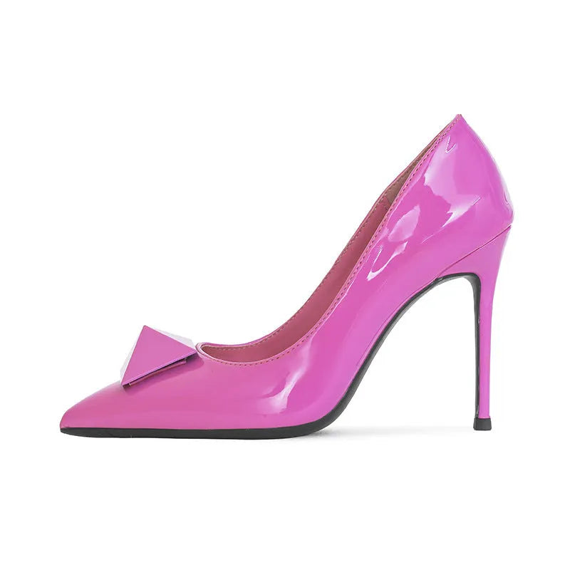 Women's pink pointed toe stiletto high heels with buckle detail on patent leather upper