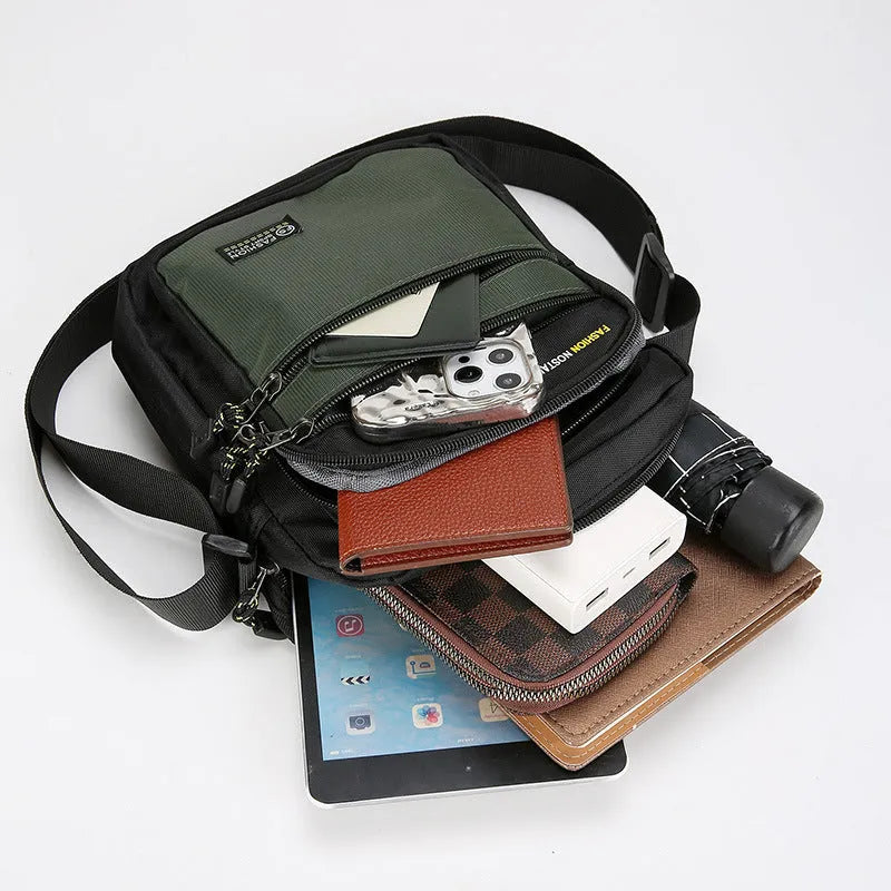 Men's nylon crossbody bag in solid colour with crossbody strap and storage compartments.