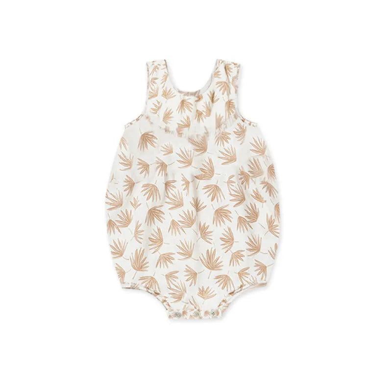 Cotton sleeveless baby romper in floral pattern, triangle jumpsuit style, shown in beige leaves colour, sizes 66cm to 90cm