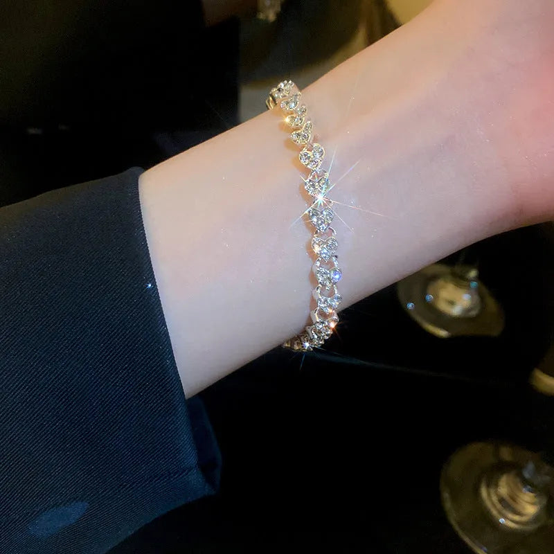 Silver heart-shaped metal bracelet for women with inlaid zircon