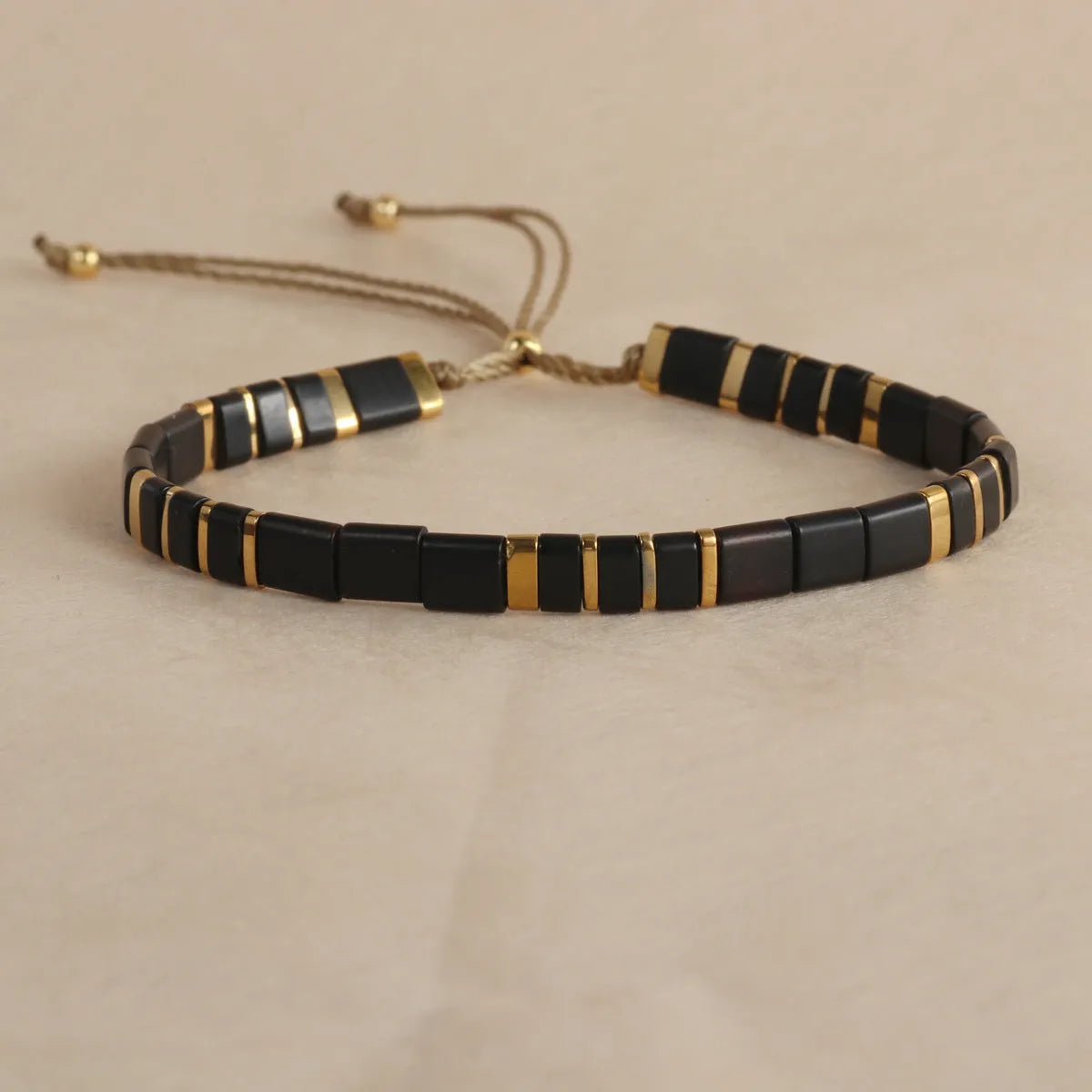 European American style pull bead bracelet with geometric designs in five colour options