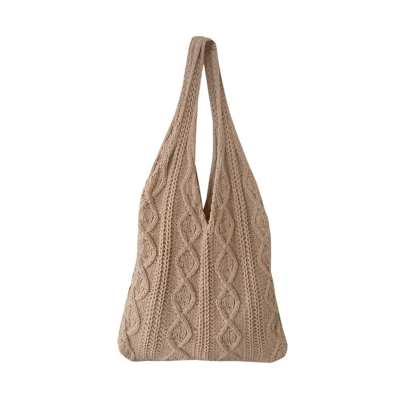 Retro hollow knitted women's tote bag in a solid colour with double shoulder straps.