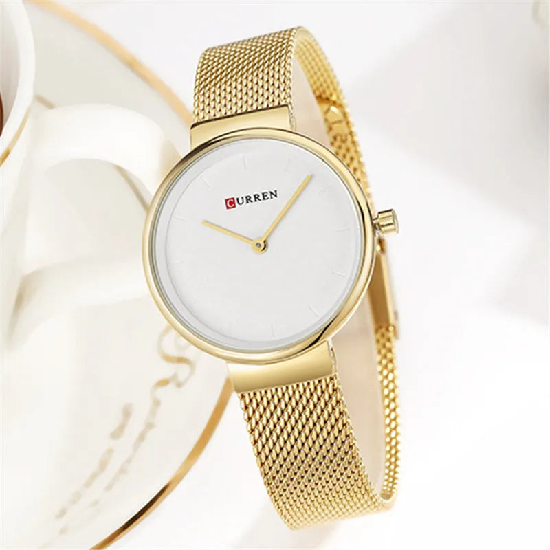 Women's quartz watch with stainless steel mesh belt and 7.8mm thin case, available in silver, gold or rose gold tone