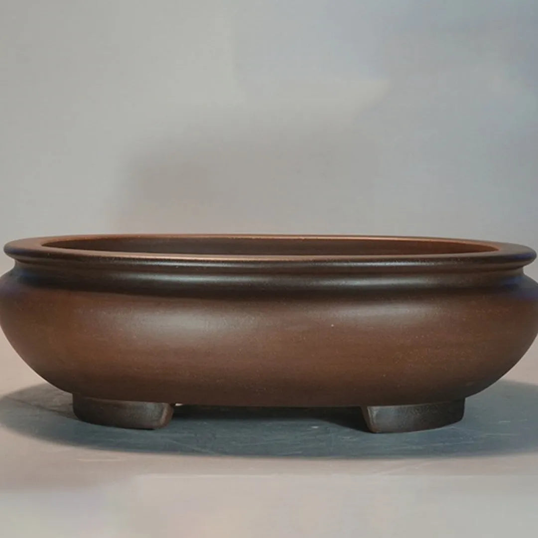 Handmade classical purple sand indoor desktop flowerpot, 58cm tall, on wooden surface.