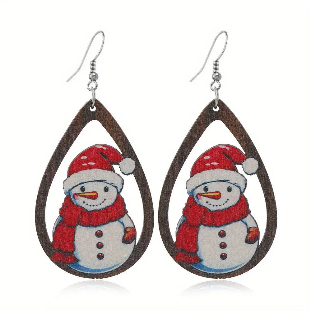 Wooden geometric earrings with printed Christmas tree and snowman Santa Claus designs.