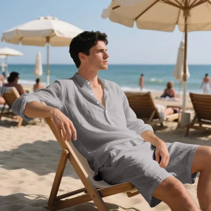 Men's linen long-sleeve shirt and shorts beach suit set on a hanger.