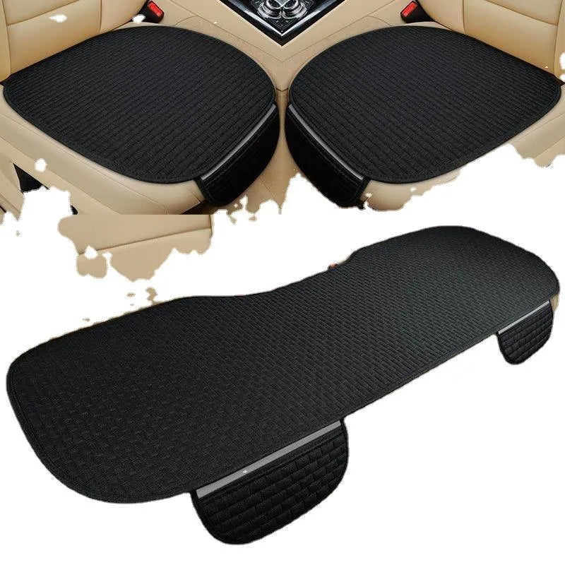 Linen car cushion set showing classic black and red, coffee, and cream colour options with hemming edge detail