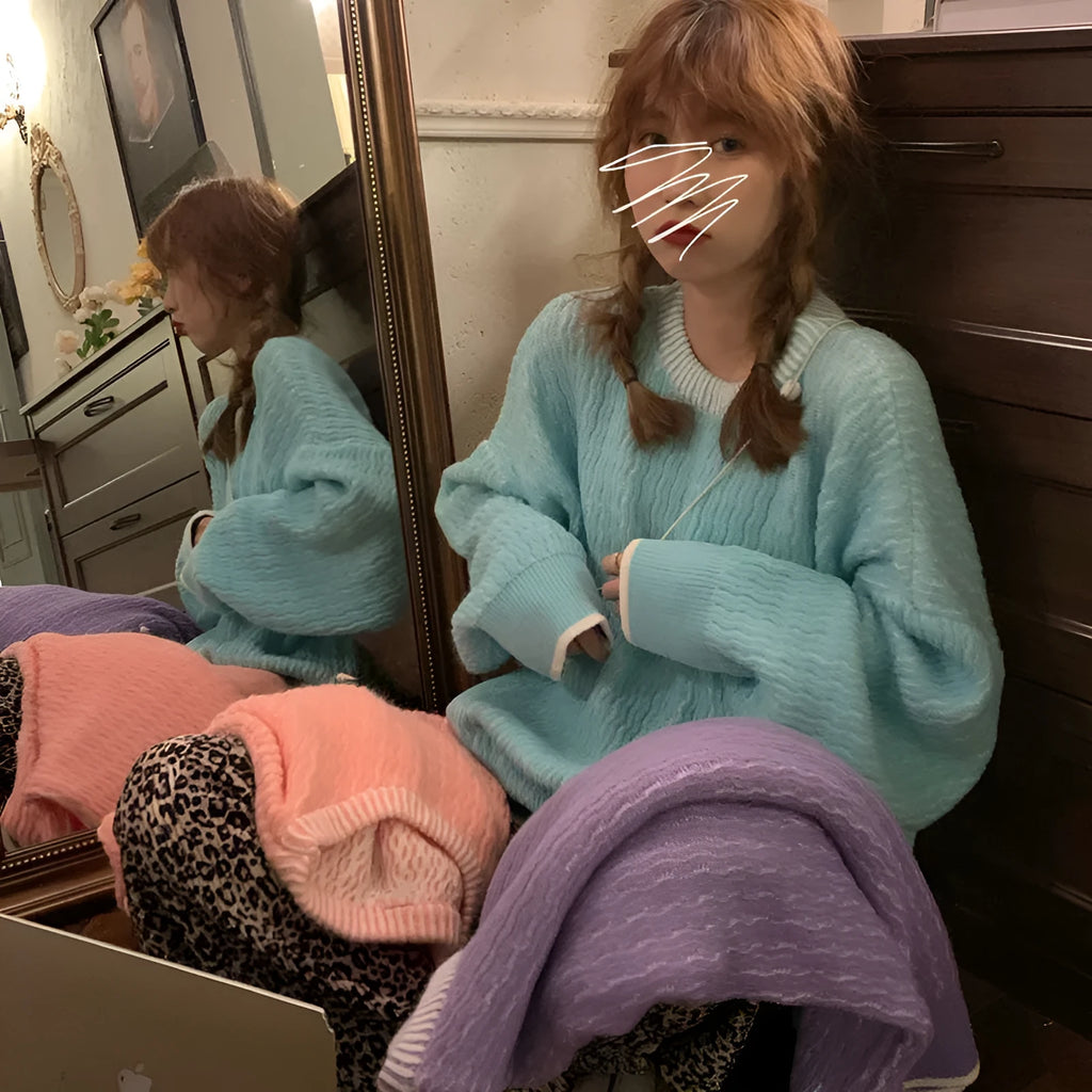 Women's loose pure colour pullover sweater in polyester fabric showing lake blue, purple, and pink colour options
