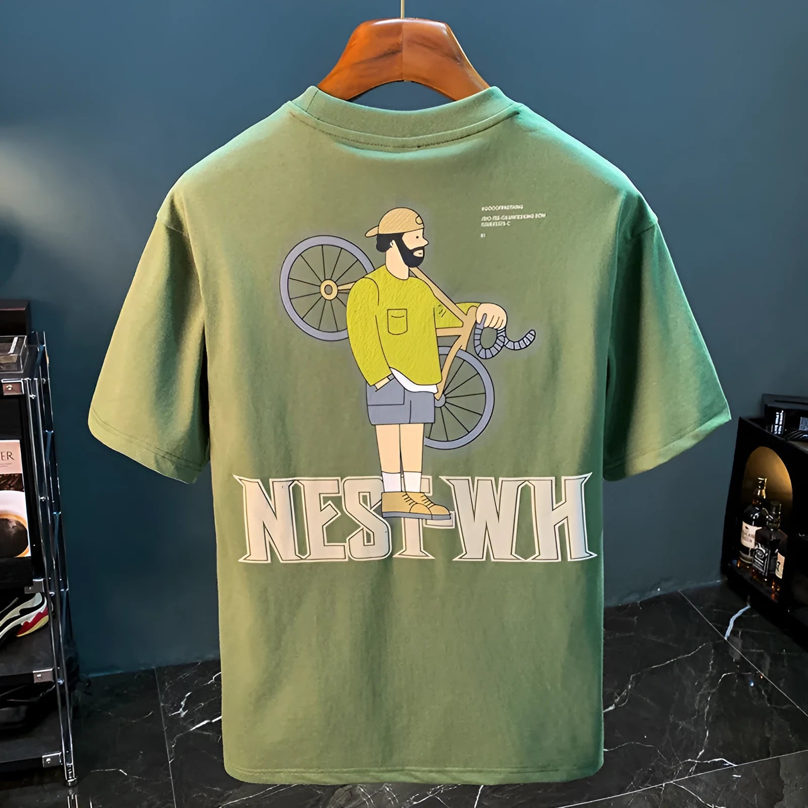 Green men's loose fit t-shirt with literary youth printed design and short sleeves