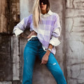Lilac plaid print women's loose sweater with ribbed trim on long sleeves.