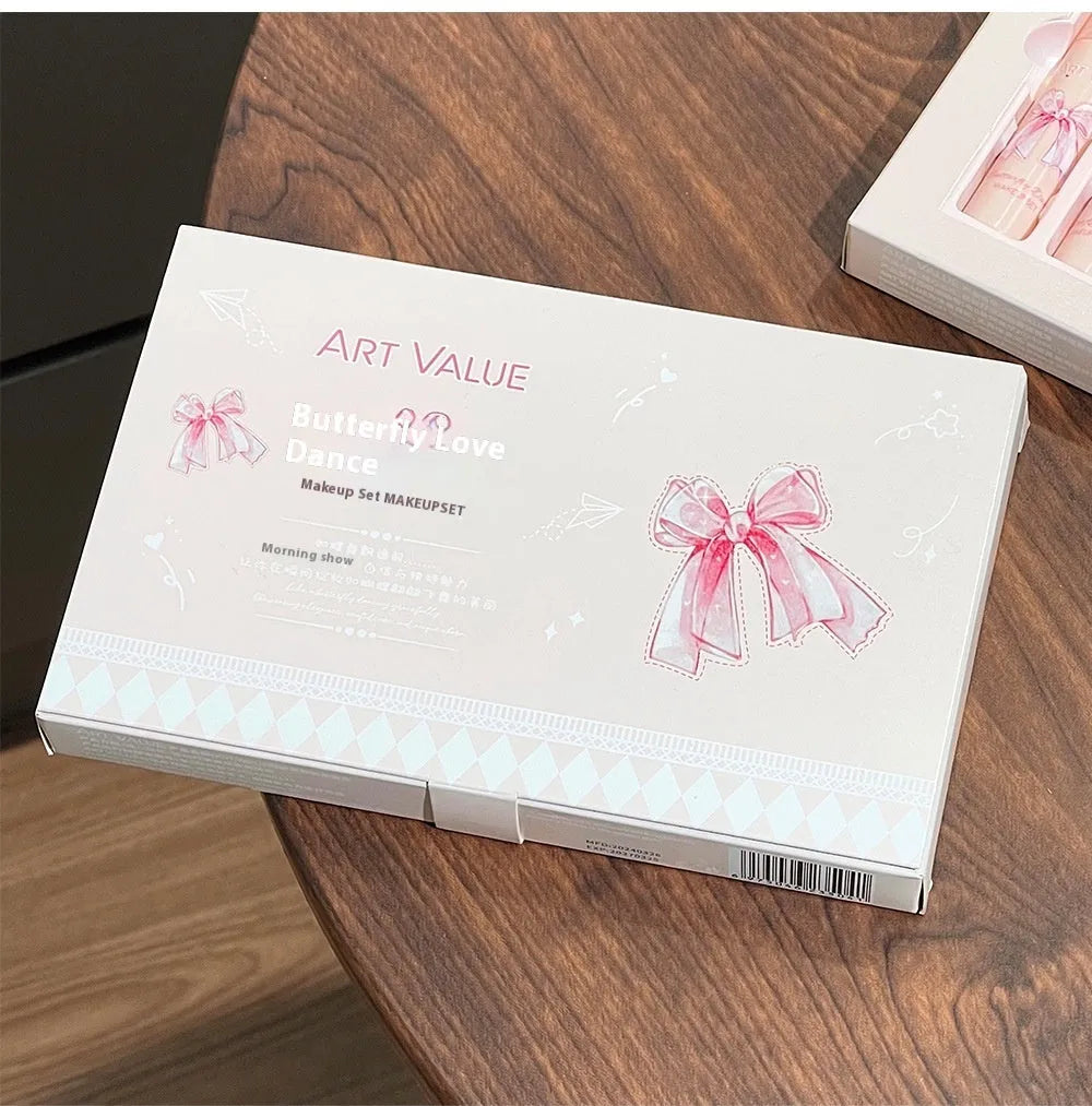 Butterfly Box pink makeup set with four matte lip muds, powder blusher and matching necklace