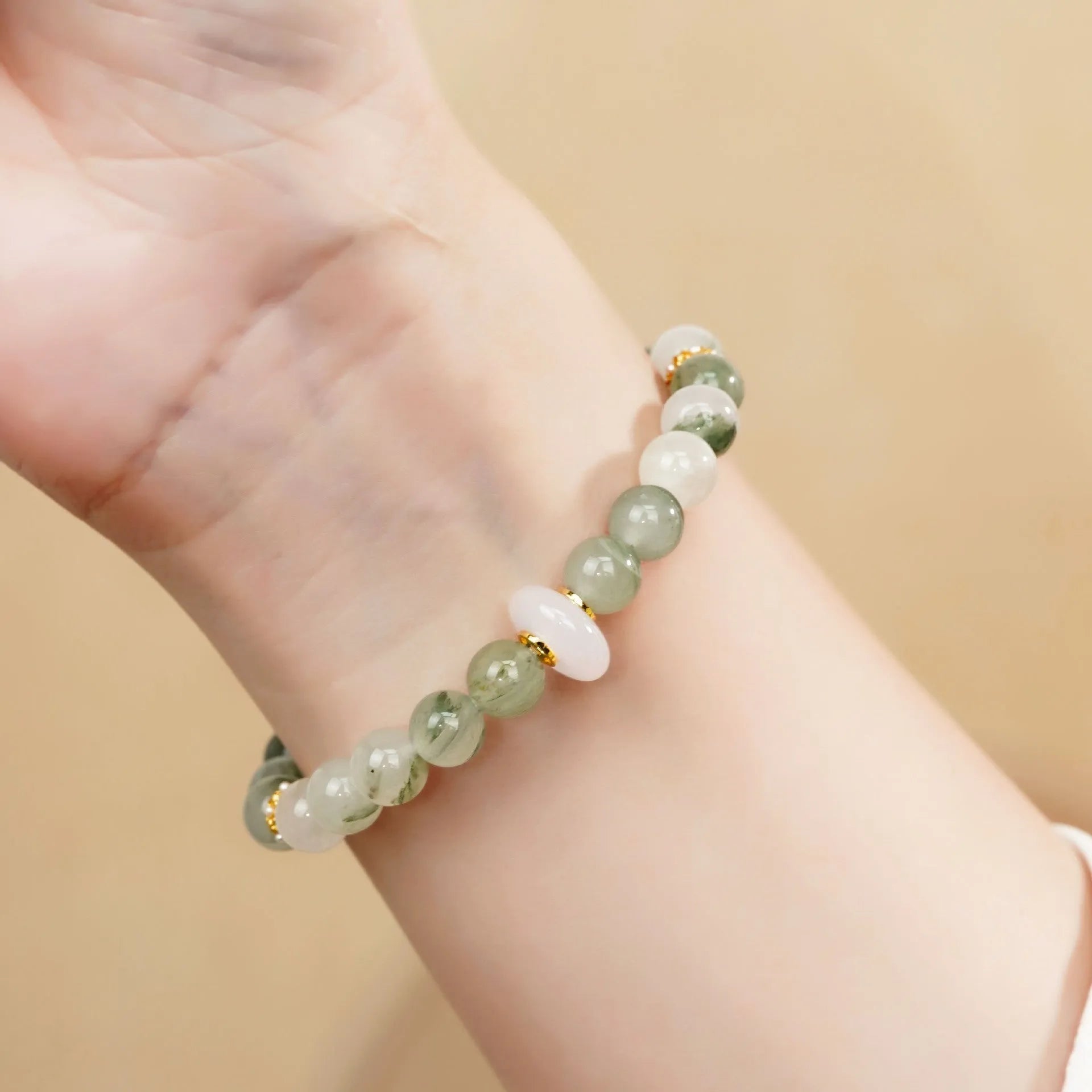 Emerald Green Tian Shan Cui women's bracelet with round beads in a Chinese national style.