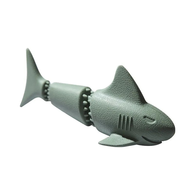 Rubber shark-shaped dog toy with ocean theme details in blue or green colour options