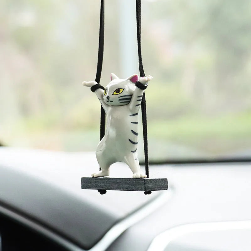 Resin cartoon cat pendant on a 25cm rope for car rear-view mirror decoration.
