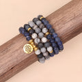 Blue multi layer bracelet with patterned network stone beads and alloy construction