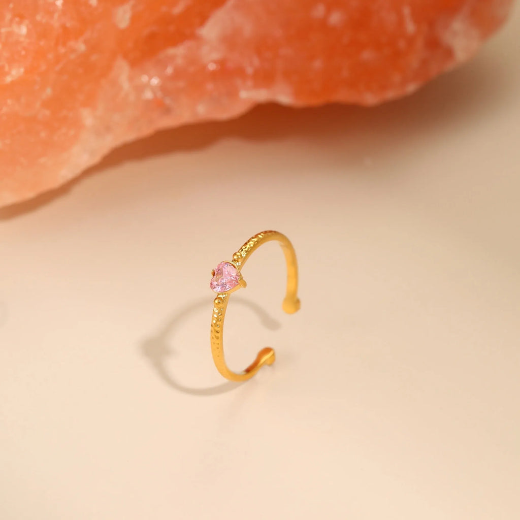 Open ended geometric heart shaped ring with inlaid zircon stones in stainless steel