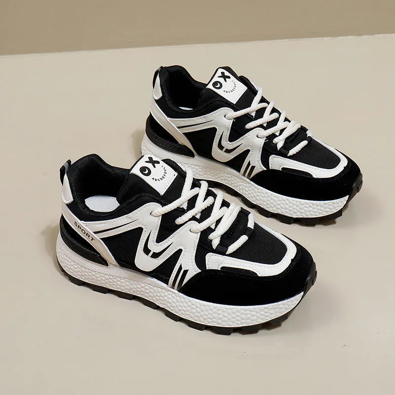 Women's black platform casual shoes with lace-up front and flat heel