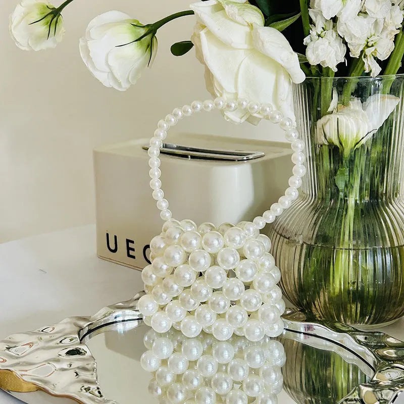 Imitation pearl geometric pattern mini crossbody handbag for women in various floral and heart styles.