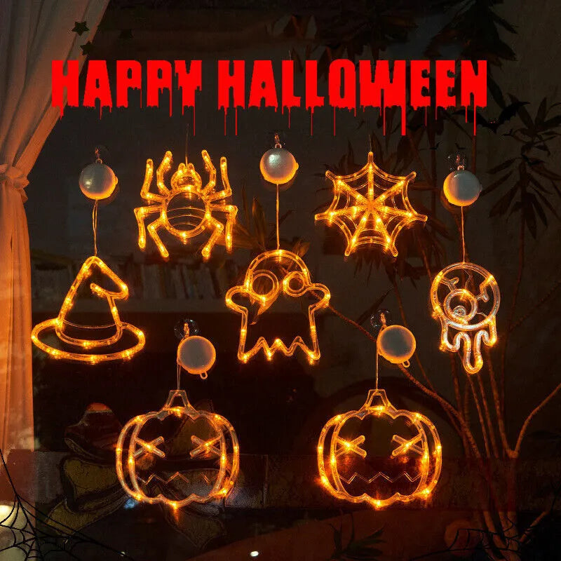 Halloween LED window lights showing spider, pumpkin and ghost designs with suction cup mounting