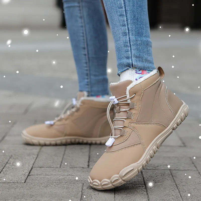 Outdoor snow boots in black, khaki, or pink with a lace-up front and rubber sole.
