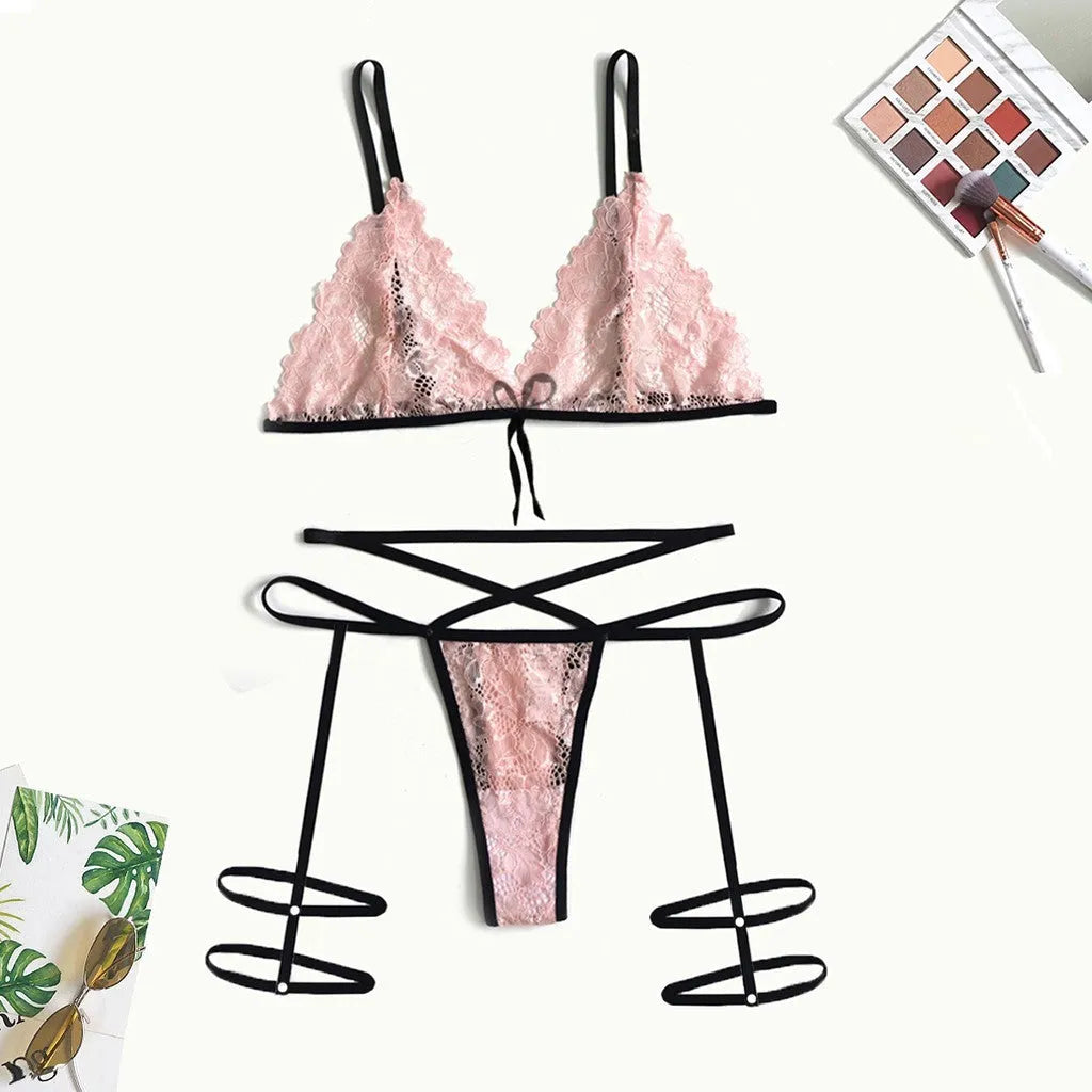 Pink lace hollow three-point lingerie set with leg straps on a model