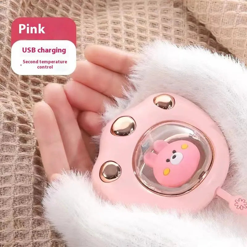 Compact USB rechargeable hand warmer power bank with digital display, shown in pink colour.