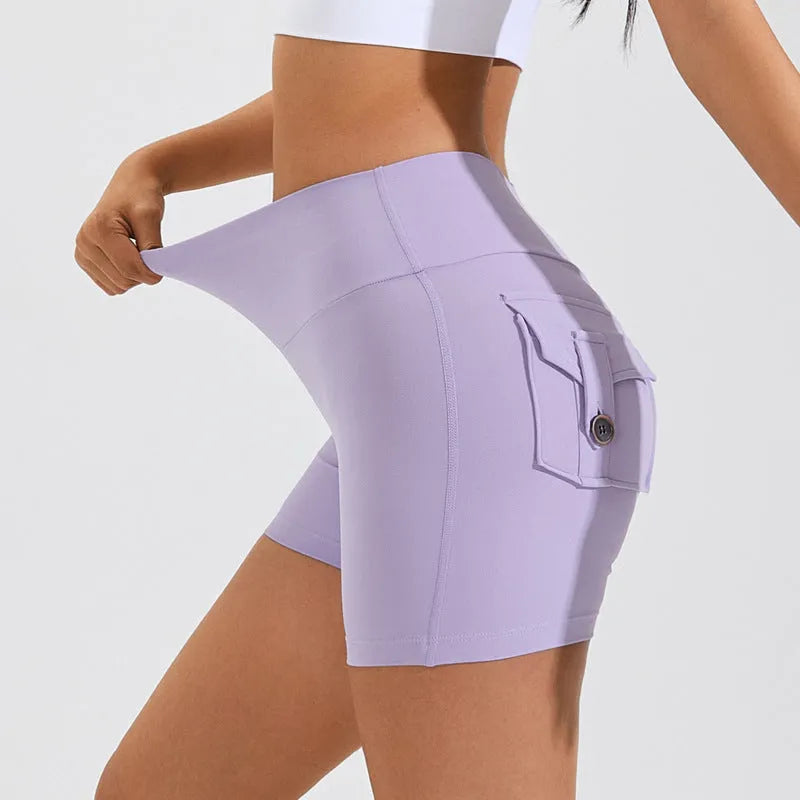 Women's high-waist hip lifting fitness shorts with pockets in electric blue colour