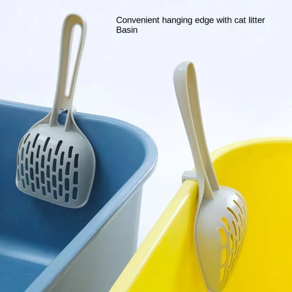 Grey plastic cat litter scoop with attached base for cleaner waste removal