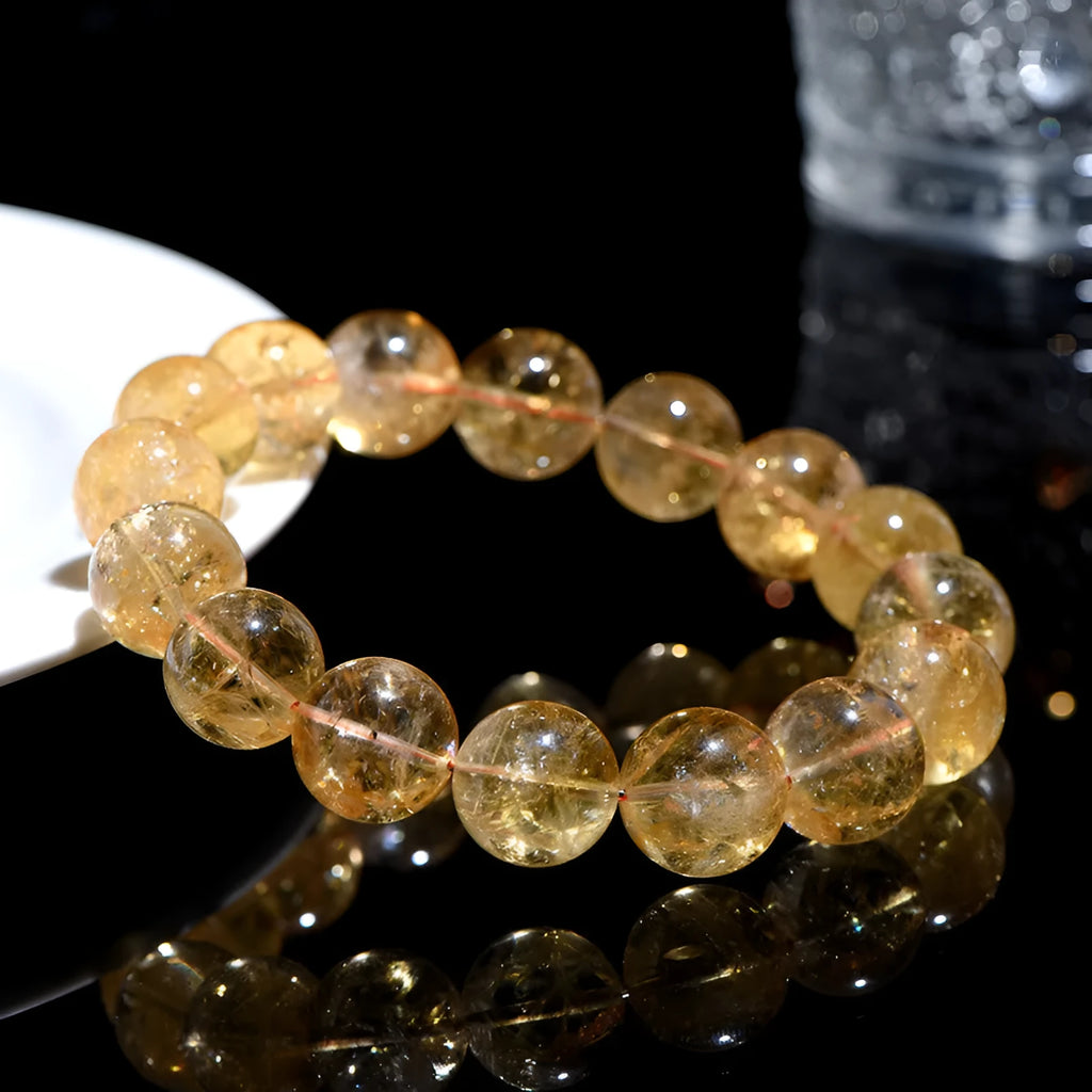 Natural yellow citrine geometric bracelet with multiple bead size options on wrist