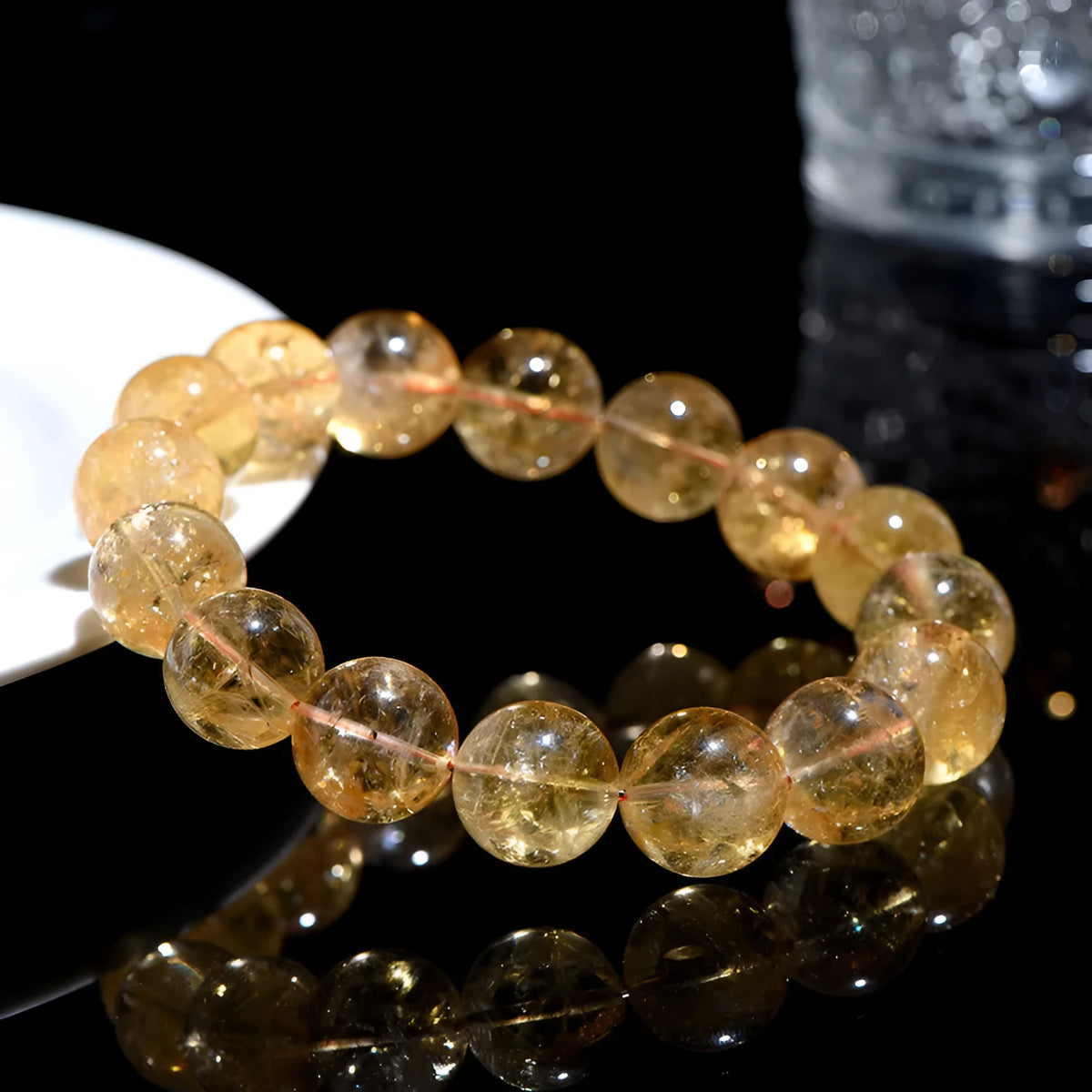 Natural yellow citrine geometric bracelet with multiple bead size options on wrist