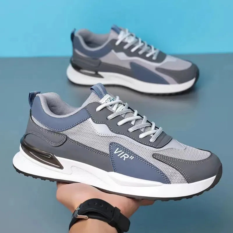 Men's colour block mesh running shoes in low-top design with lace-up front.