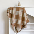 Cashmere-like scarf with tassel ends in brown colour, shown draped to display 185 cm length