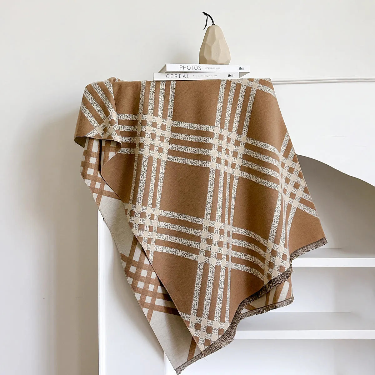Cashmere-like scarf with tassel ends in brown colour, shown draped to display 185 cm length