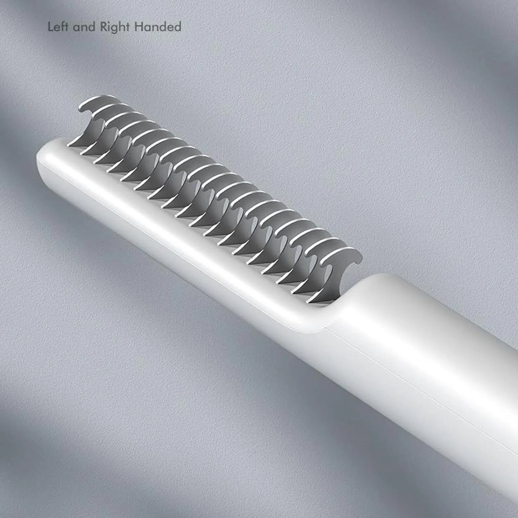 Stainless steel pet dematting comb with ergonomic handle in pink colour.