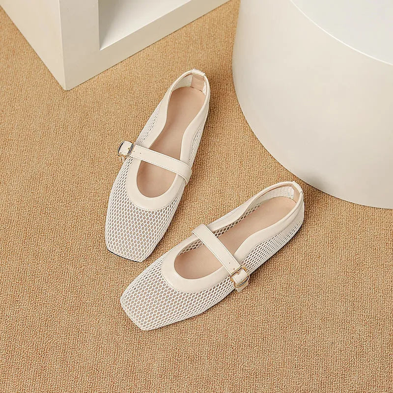 Women's beige mesh buckle sandals with a square toe and flat heel on a white background.