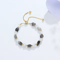 Women's crystal white opal beaded bracelet in amethyst, pink crystal, or black hair crystal with polished finish