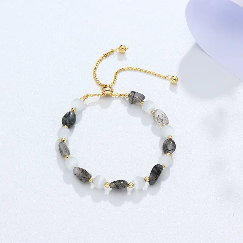 Women's crystal white opal beaded bracelet in amethyst, pink crystal, or black hair crystal with polished finish