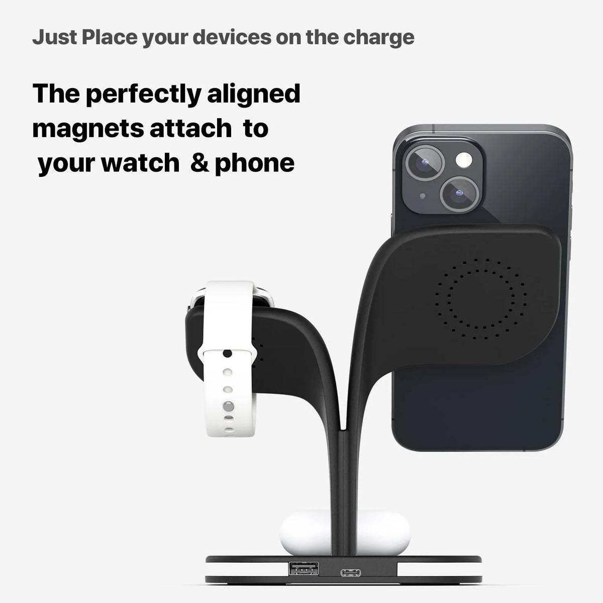 Black wireless charging desk stand showing phone, watch, and headphones charging simultaneously